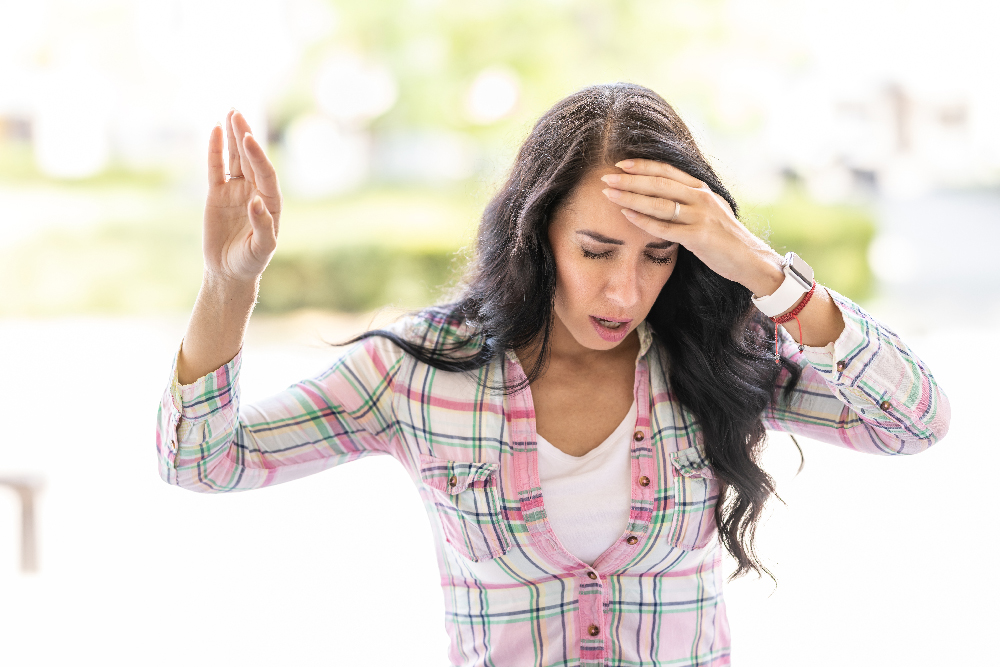 woman suffering from vertigo